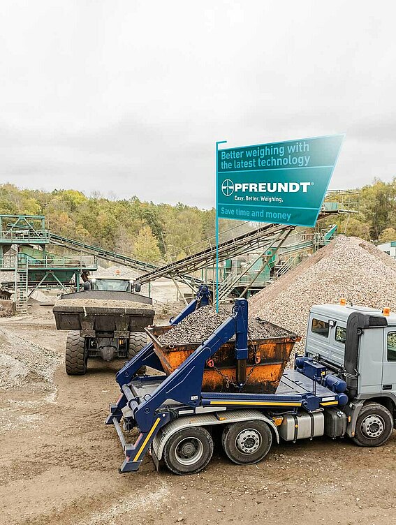 Vehicles with weighing technology on large mining area 