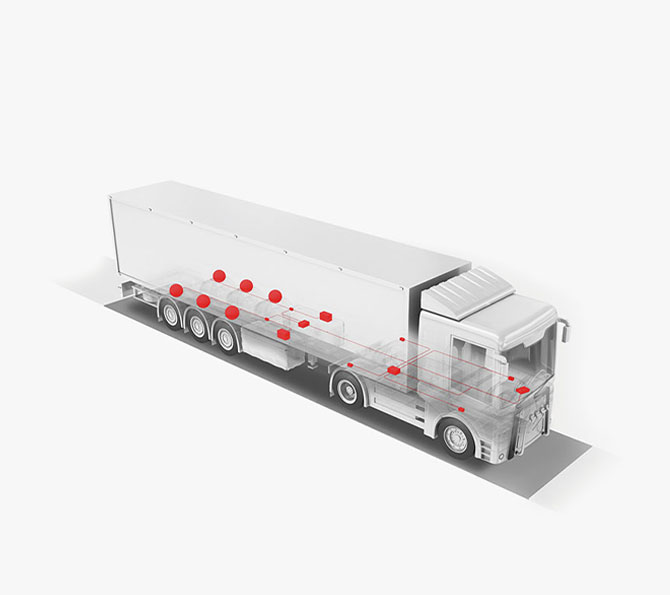 Illustration of a truck, with load cells highlighted in red, symbolising PFREUNDT’s mobile weighing systems.