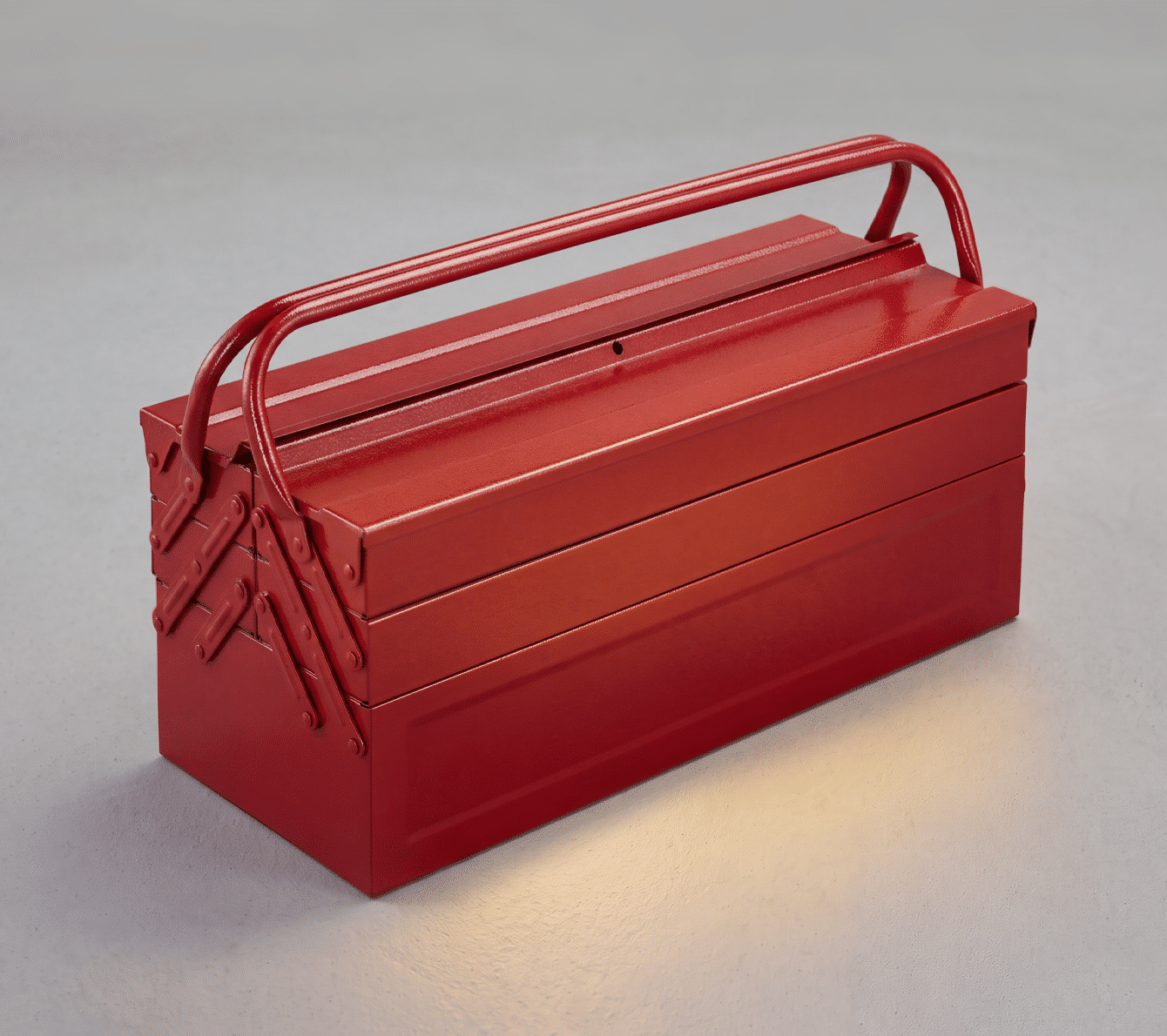 Roter Werkzeugkasten mit Henkel auf grauem Hintergrund, symbolisiert mobile Lösungen von PFREUNDT.