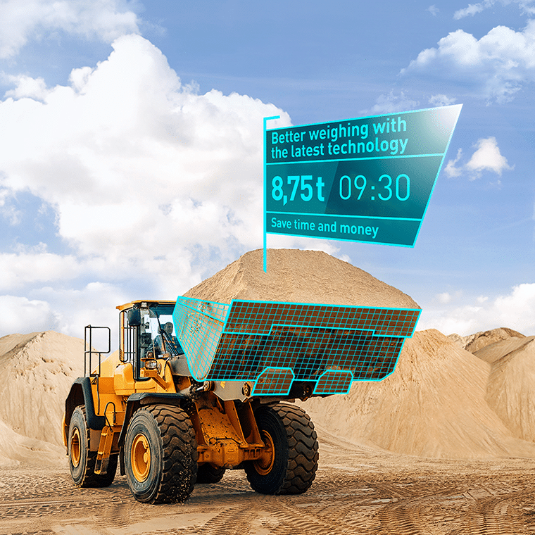 A PFREUNDT wheel loader fitted with a digital weighing system displays 8.75 tonnes. Efficient mobile weighing technology for the construction and industrial sectors.